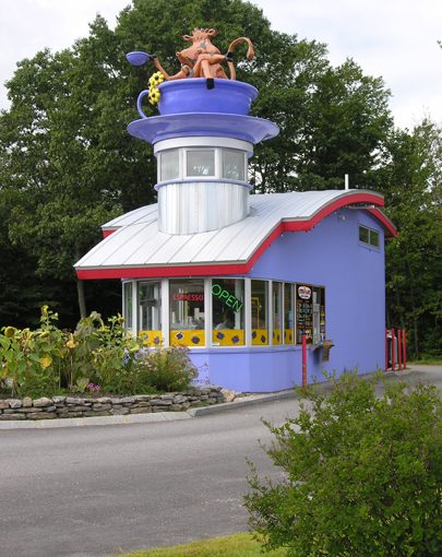 Small coffeeshop with unique sculpture atop. Designed by Whipple|Callender Architects.